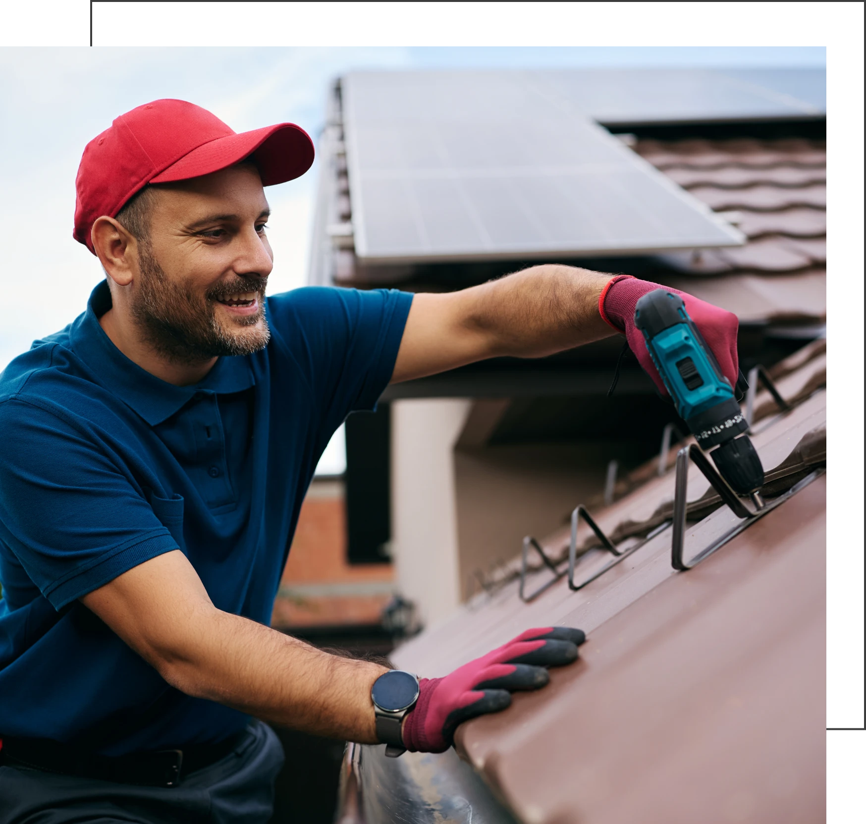 Worker securing solar equipment outdoors